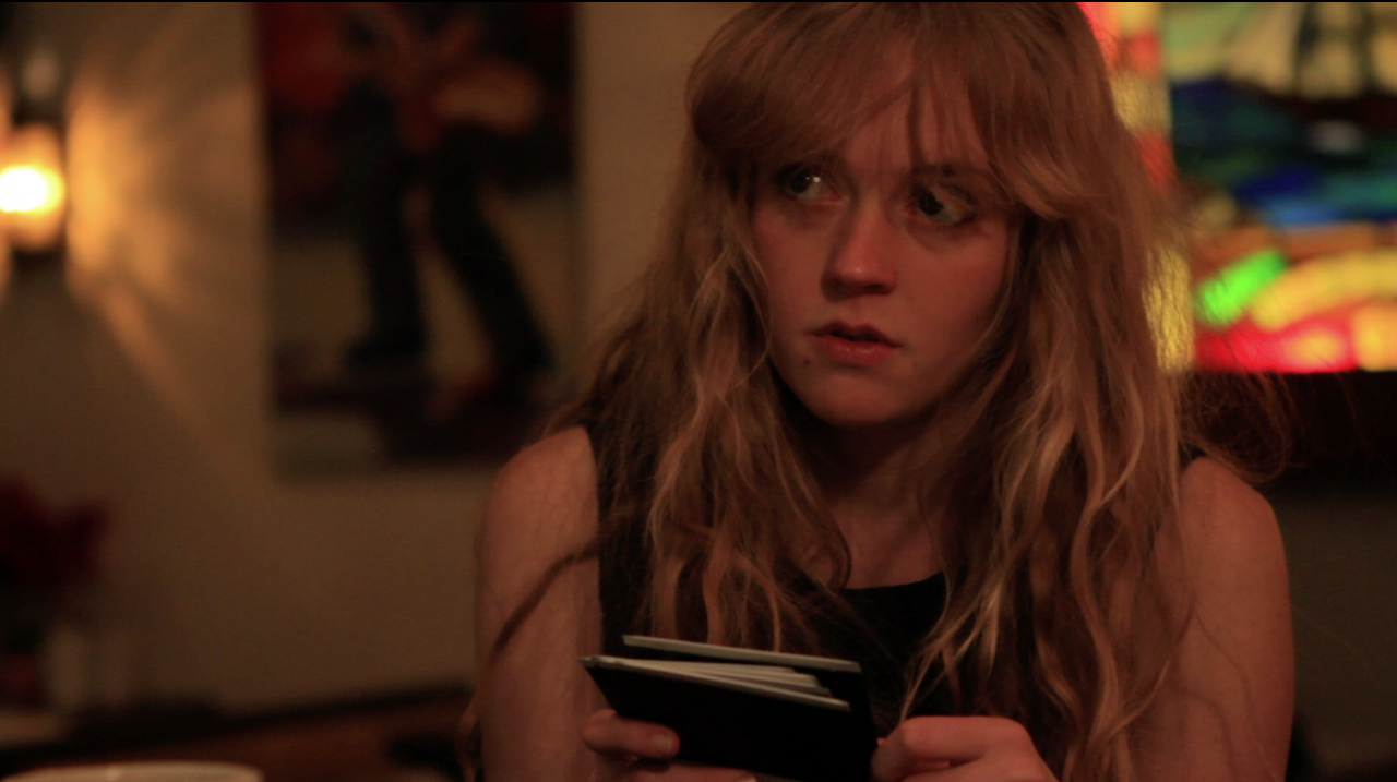 rose with photos at diner.png