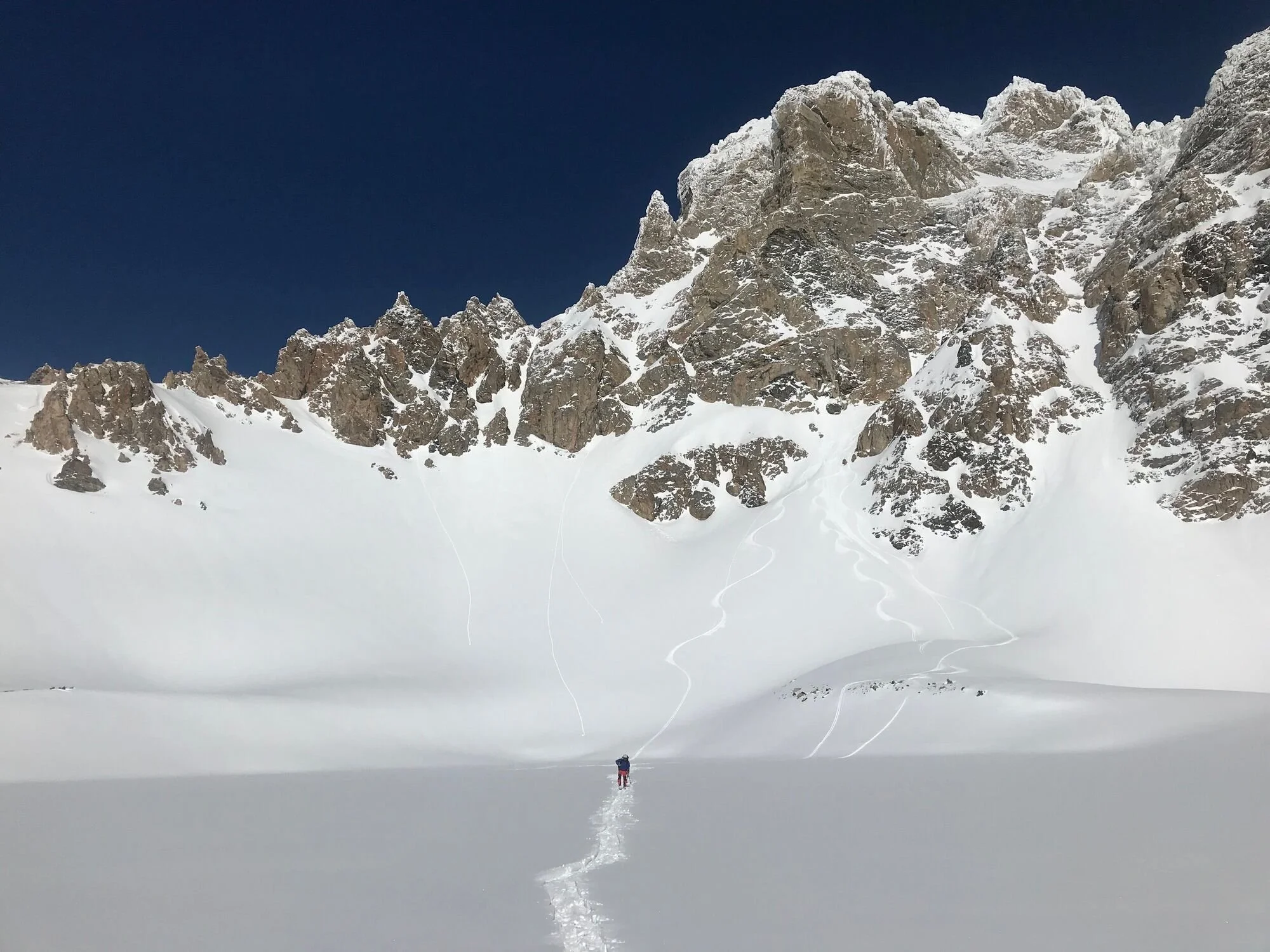 backcountry-skier-breaking-trail-teton-peaks.jpeg