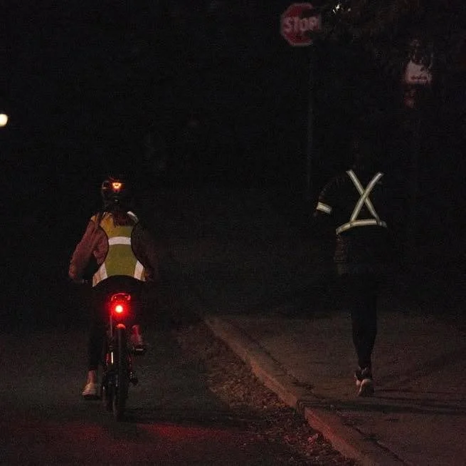 Look at the difference what you wear can have on your visibility. 

Pedestrians are encouraged to wear bright colors, reflective gear, or use a flashlight to make themselves more visible to drivers. Pedestrians should also cross at designated crosswa