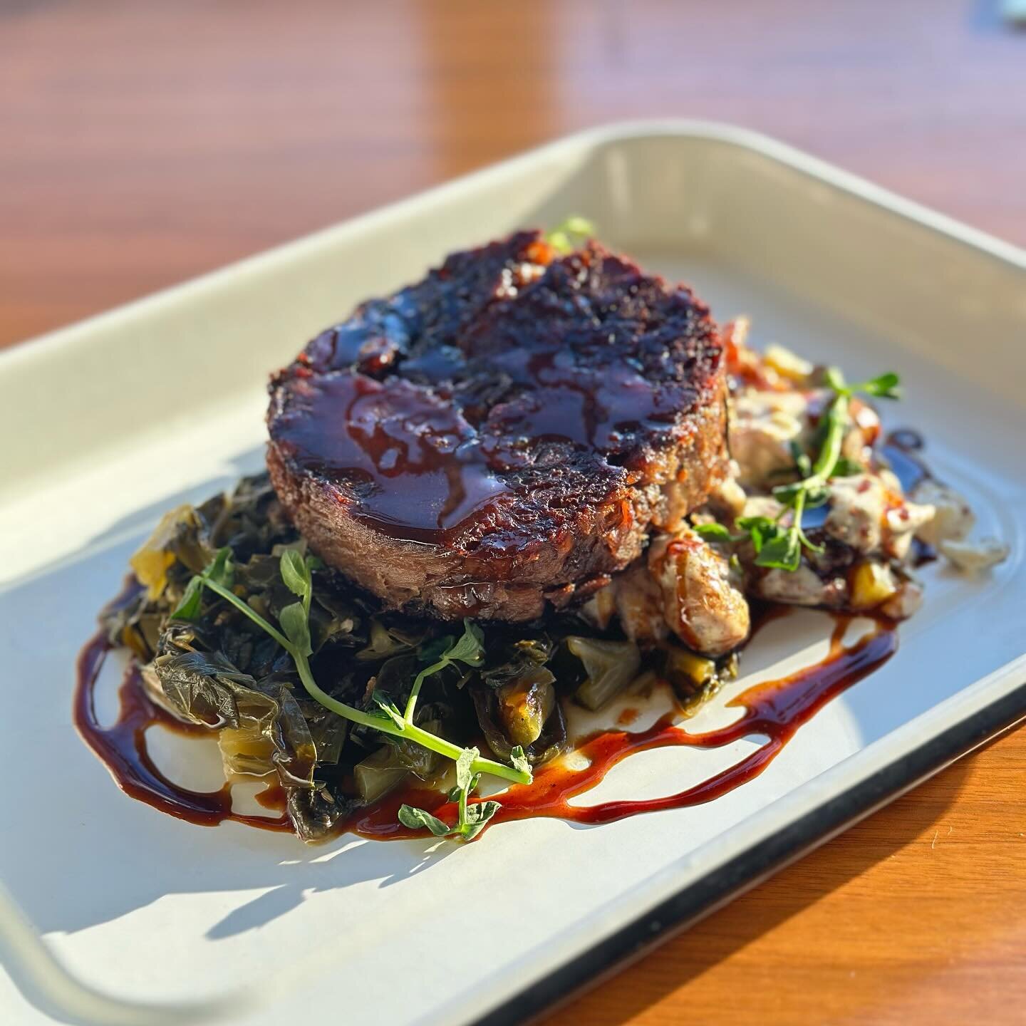 A little cheeky Monday for ya 😉

Pork cheeks with collard greens and fried potato salad on special. 

She&rsquo;s a beaut 🫶

Open today til 11pm! Kitchen til 9pm ✅

#birdistheword #brewery #restaurant #rochesterny #eatlocal #drinklocal #porkcheek