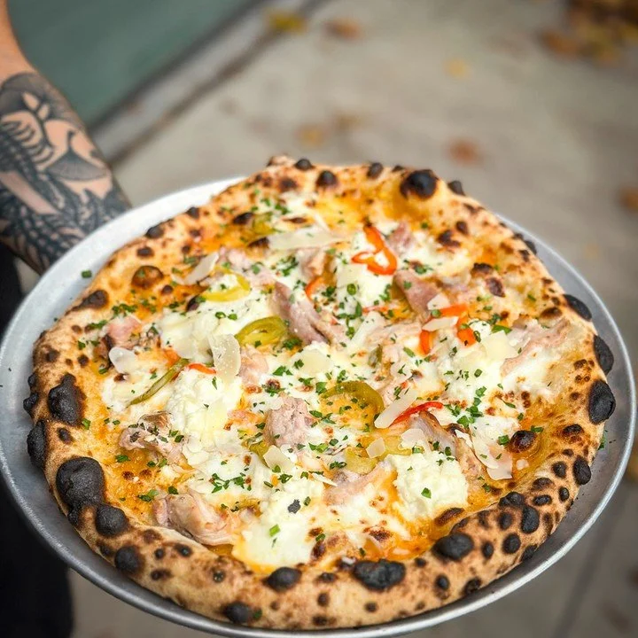 Where there's smoke, there's..SMOKED CHICKEN PIZZA💨🫡

Pulled smoked chicken (from our very own smoker right outside the brewery), vodka sauce, mozzarella, creamy ricotta, and tangy house pickled peppers.  Come try this flavor bomb of a special toda