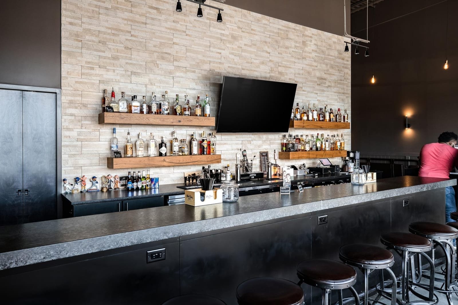 Scissors and Scotch, where you can sip a cocktail while getting a haircut,  opens at Prairie Village's Corinth Quarter