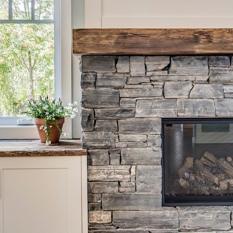 The beautiful Rundle Rock used on the fireplace in the modern farmhouse renovation is one of our absolute favourite stones. It may look familiar as it is the entire facade of the Banff Springs Hotel and is also mined just an hour away from Calgary in