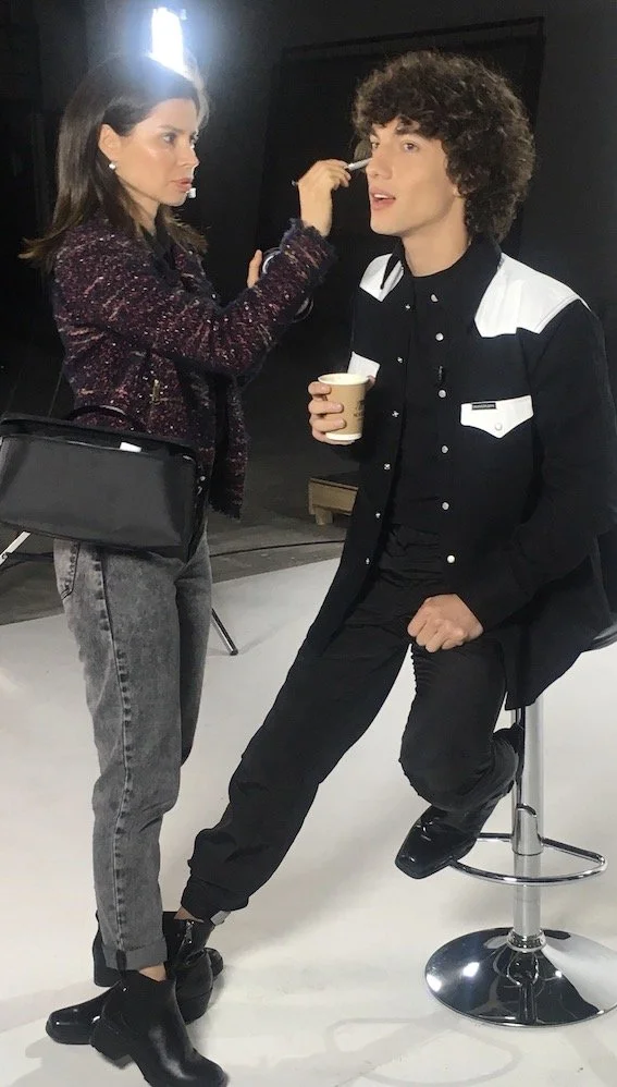 Pia Bedregal Touching Up Jorge López’s Makeup Before Studio Shoot