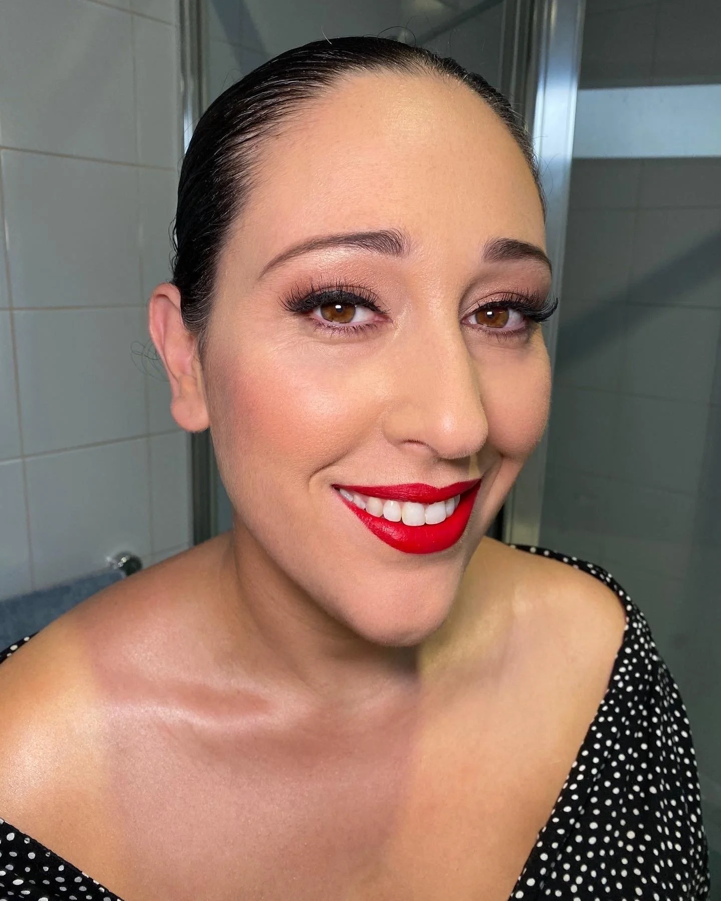 Glam Makeup with Bold Red Lips and Winged Eyeliner
