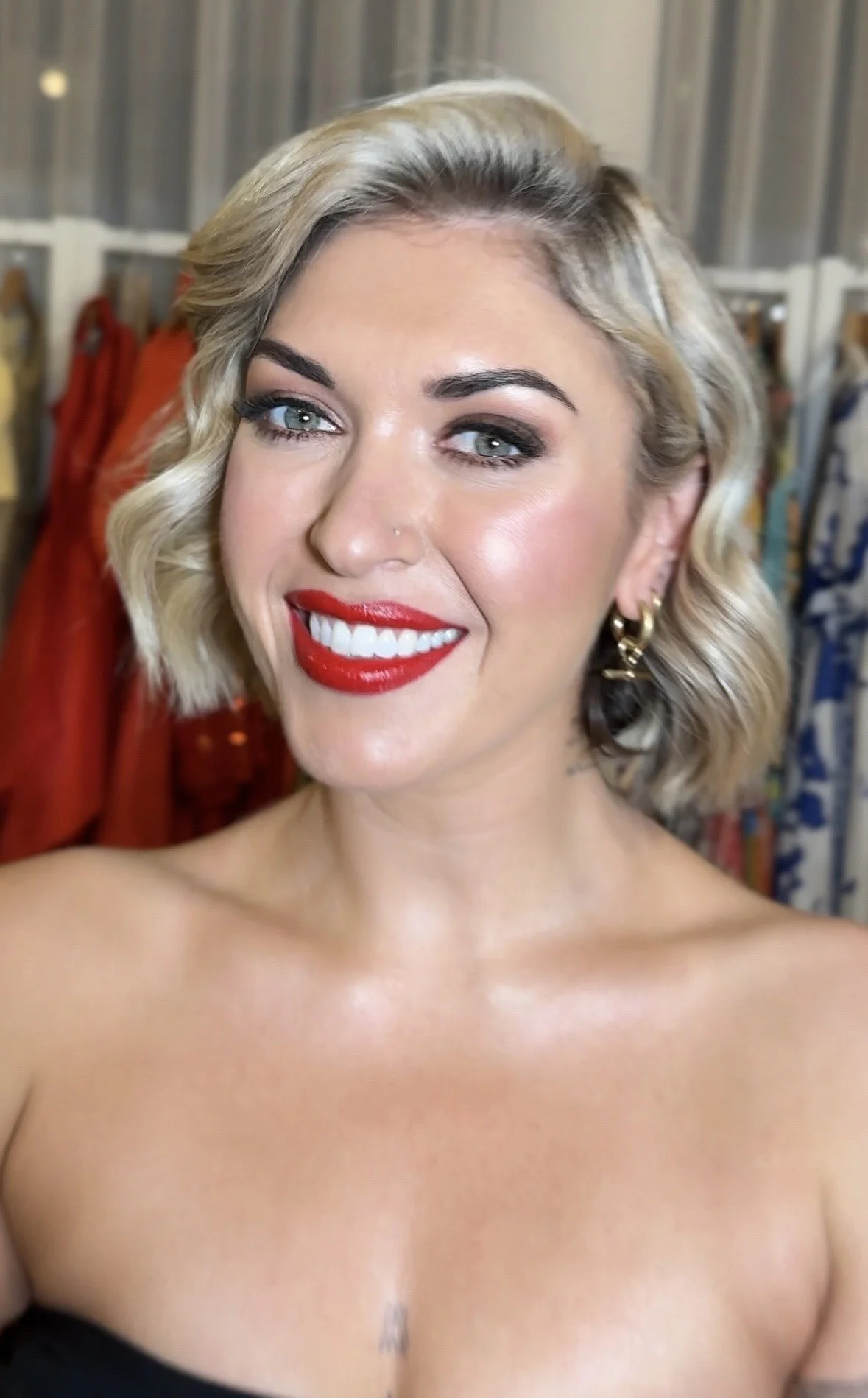 Eli Moulton with Glowing Skin, Mauve Eyes, and Glossy Red Lips