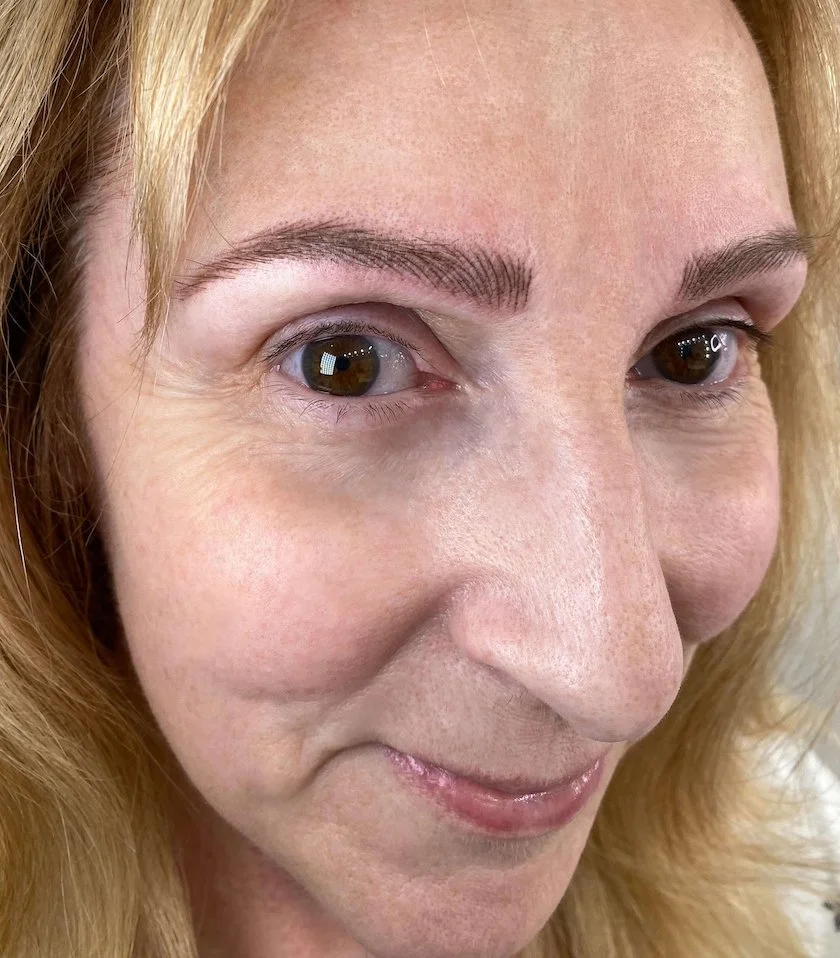 After Her Eyebrow Tattoo