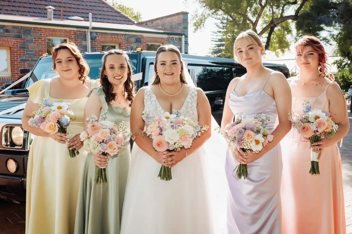 Bride holding her bouquet after bridal makeup and hair in Glenelg, Adelaide