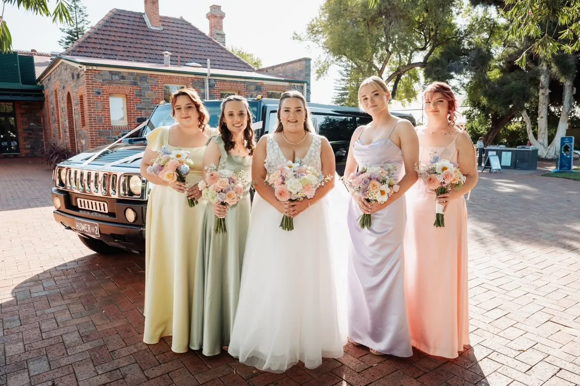Bride and bridesmaids together before the wedding celebration