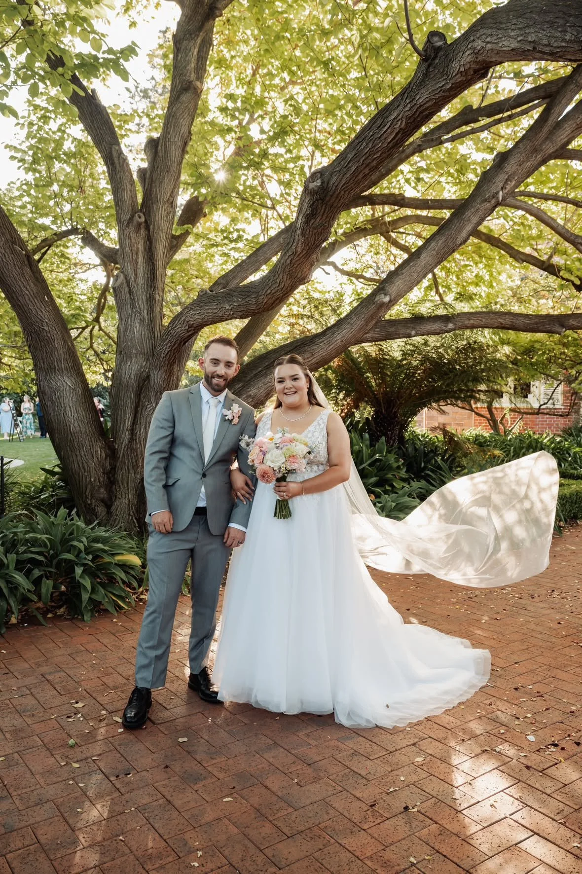 Bride and Groom with Her Bouquet After Bridal Makeup and Hair in Glenelg, Adelaide