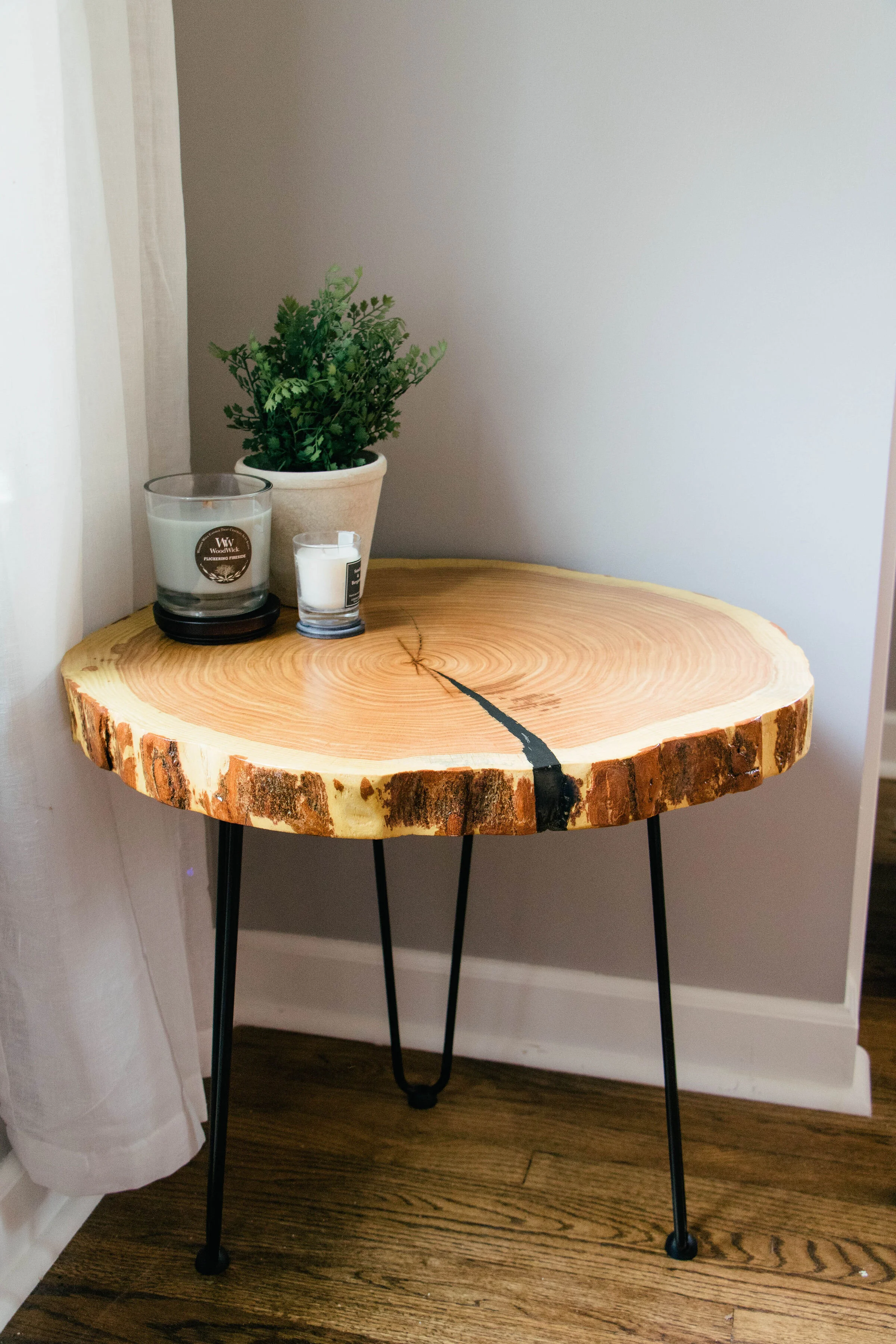 Live edge honey locust end table.