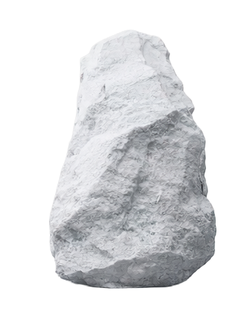 Gros caillou blanc en pierre, positionné verticalement.