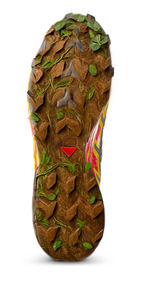 Semelle de chaussure avec design qui ressemble à de la terre et des feuilles.