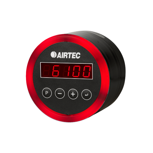 A black and red electronic device with the brand name 'AIRTEC' on it, displaying the number 6100 on a digital screen, with buttons labeled P, -, +, and an arrow.