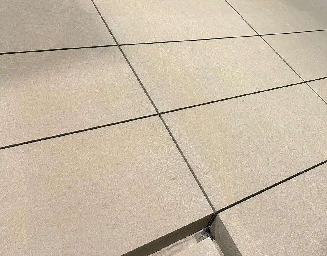 Image of Shanlieves Briswood Buff Sandstone - flags laid with an open joint showcasing the sandstone natural stone pavers as supplied by Shanlieve Stone from Newry across the UK & Ireland 