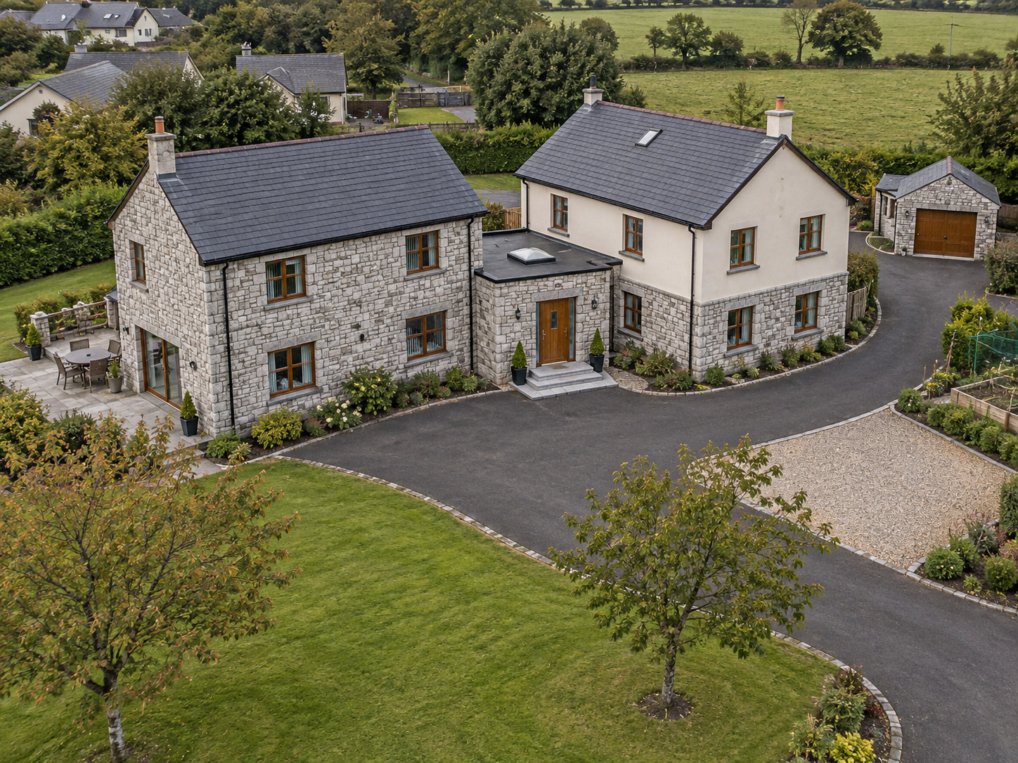 Illustrative aerial view of a detached home combining natural stone cladding and cream render