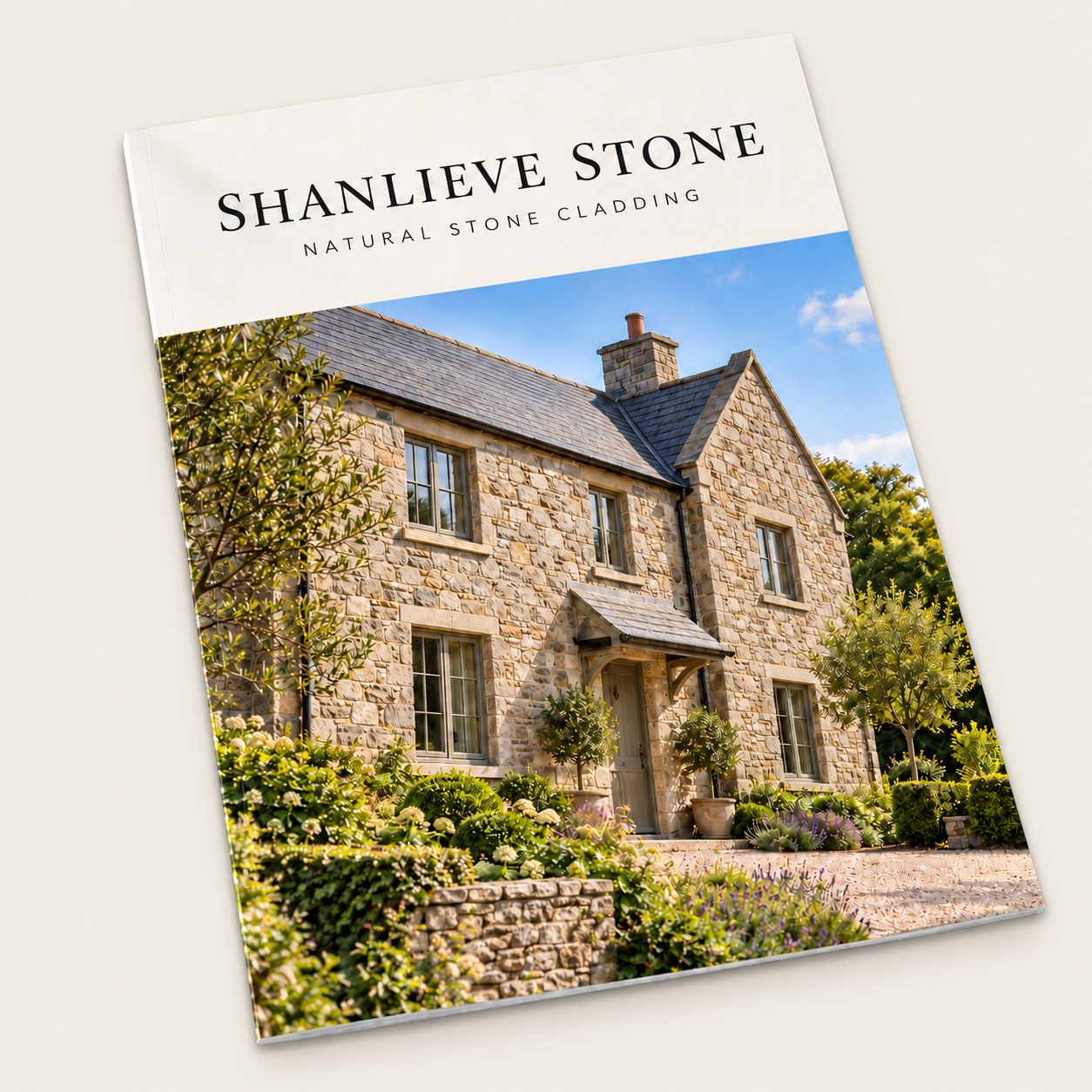 Illustrative mockup of the Shanlieve Stone natural stone cladding brochure, featuring a stone-clad house on the cover.