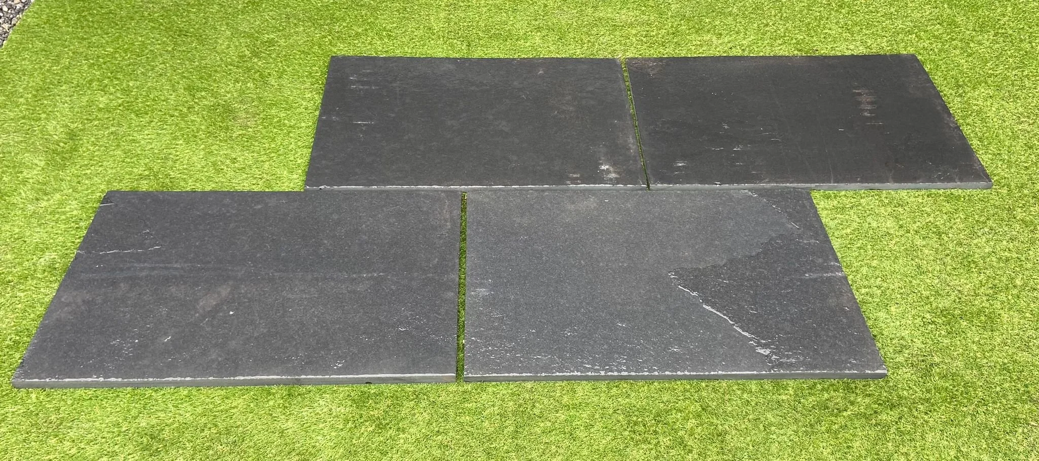 Image of black Limestone paving laid on a pathway in Newry