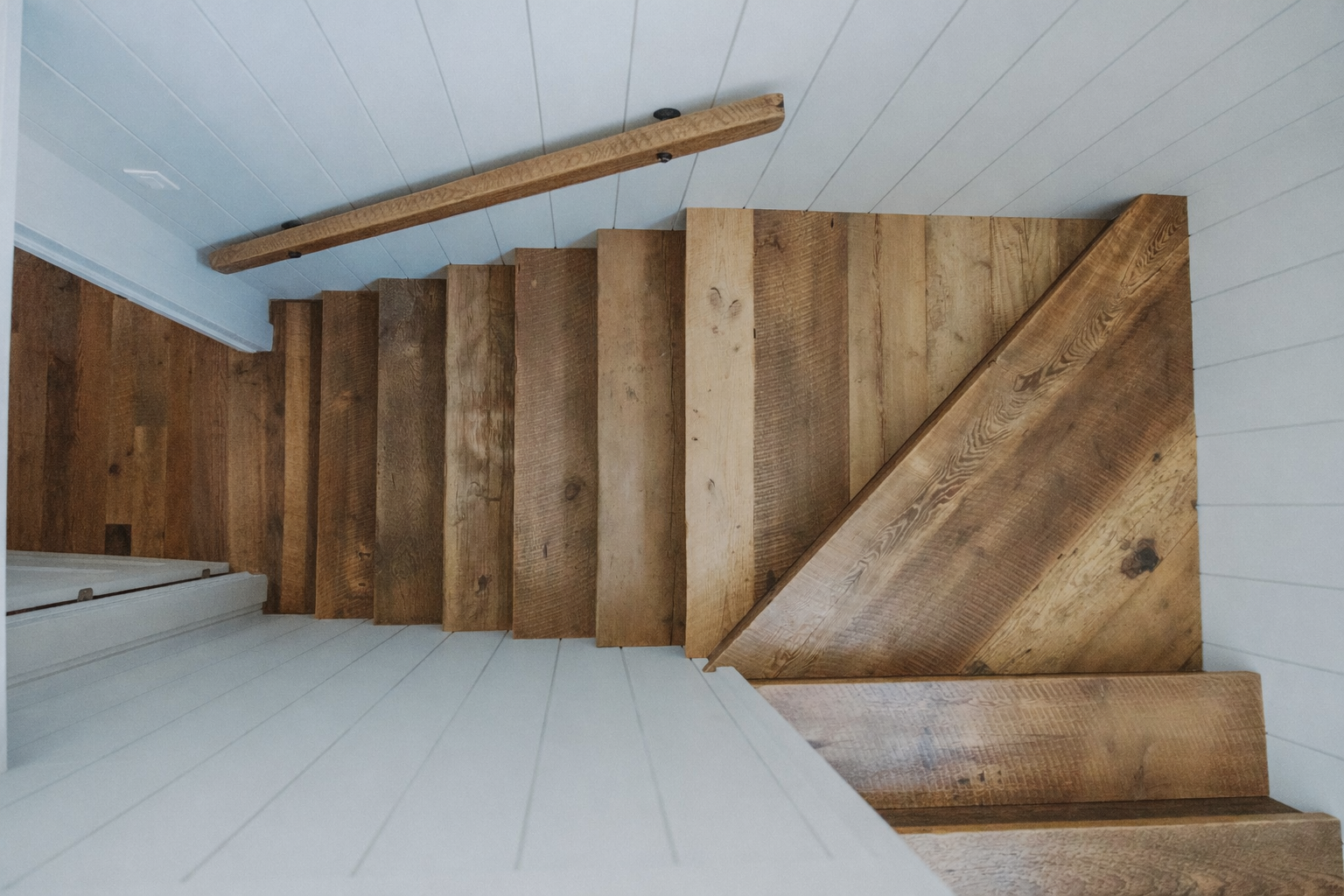 BArnwood staircase design for new addition on a century farmhouse in Hinchinbrooke