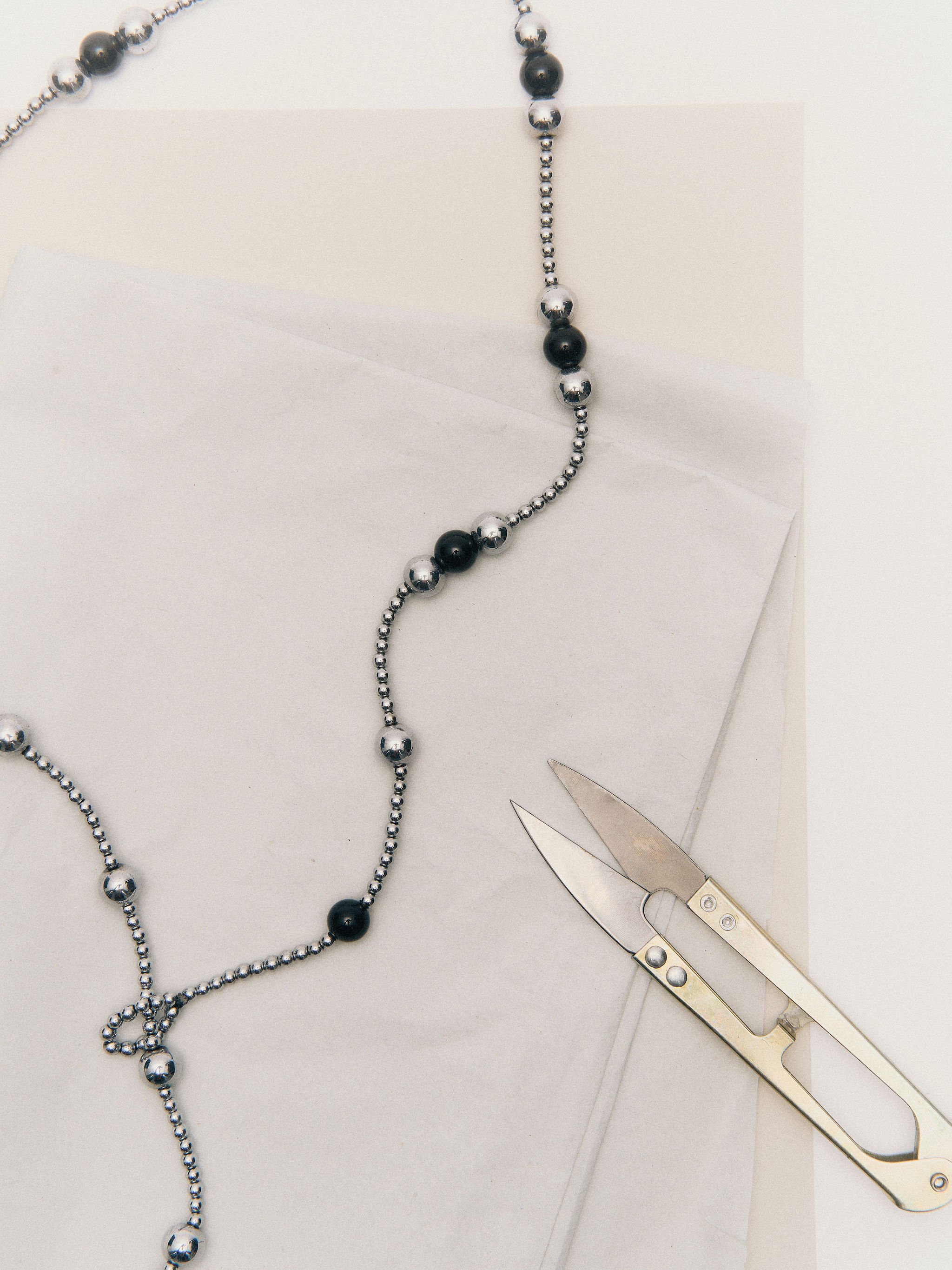 Orbit Necklace — Rhodium Hematite & Black Onyx
