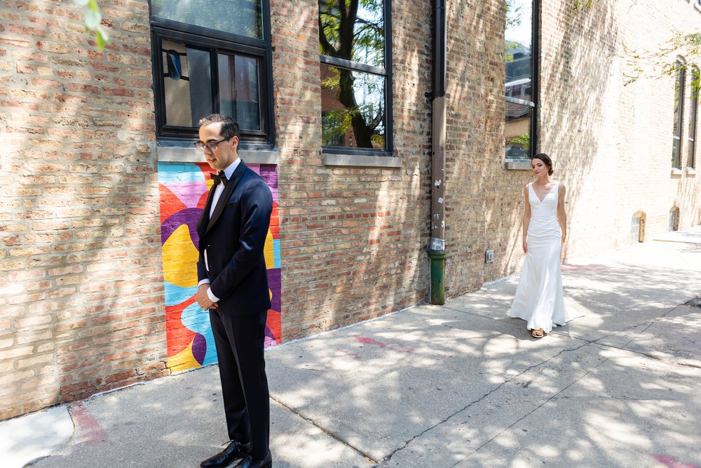 Bride_groom_First_Look_Walk_on_Street_in_Chicago.jpg