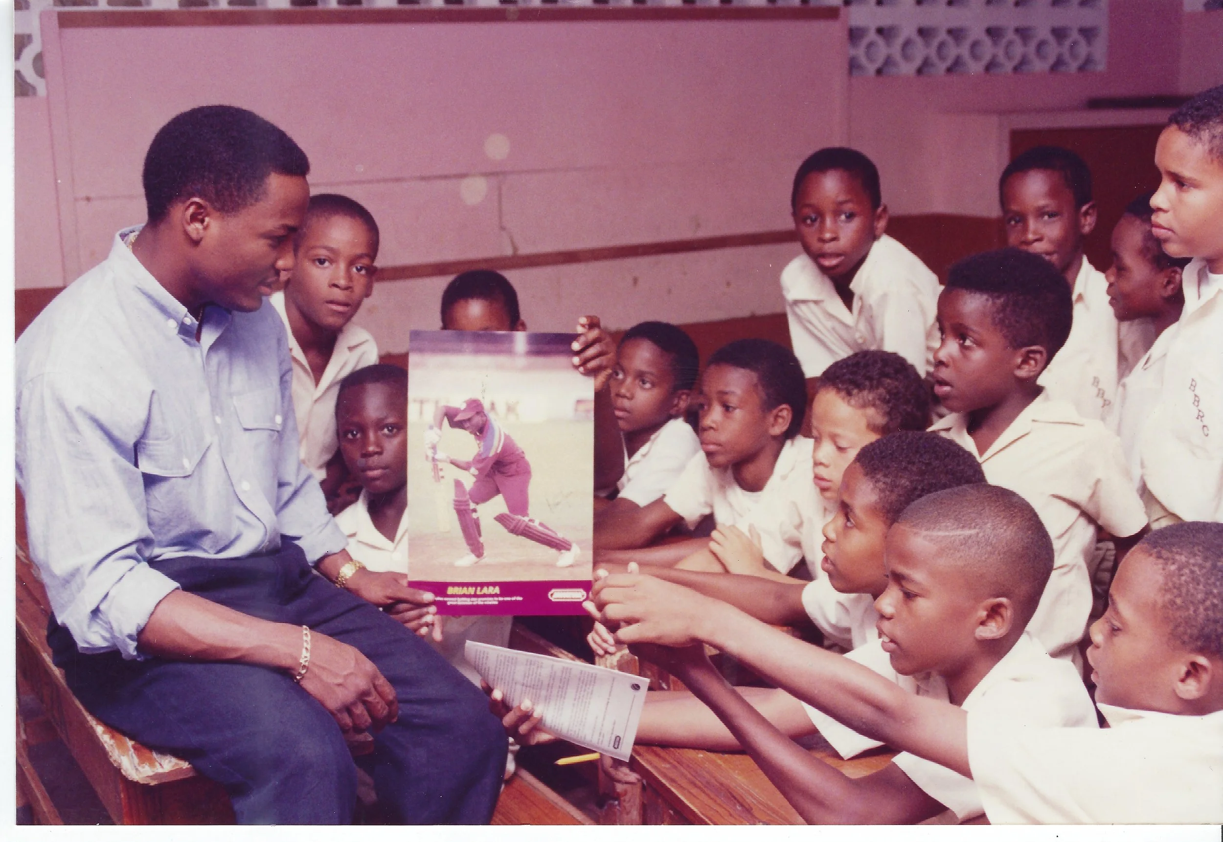  The World's greatest batsman, Brian Lara, on a motivational school tour coordinated by SWF&CO. Here on poster demonstrating his forward defensive shot.   