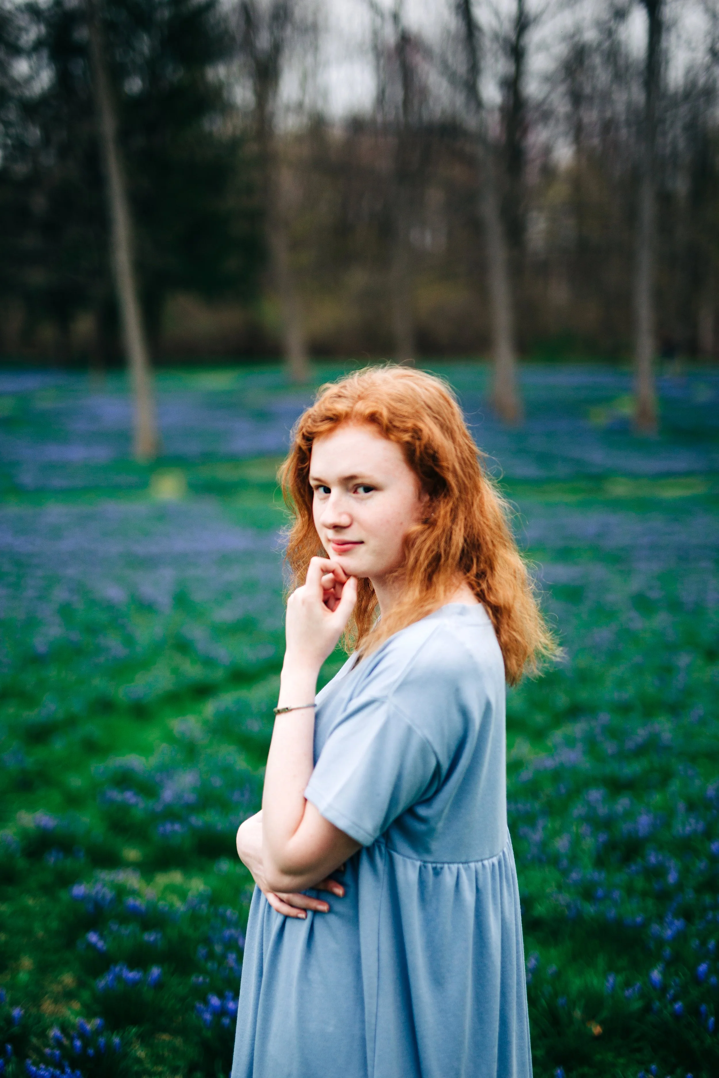 Haunting portrait of a young woman at Lock Ridge Park with bluebells in the background