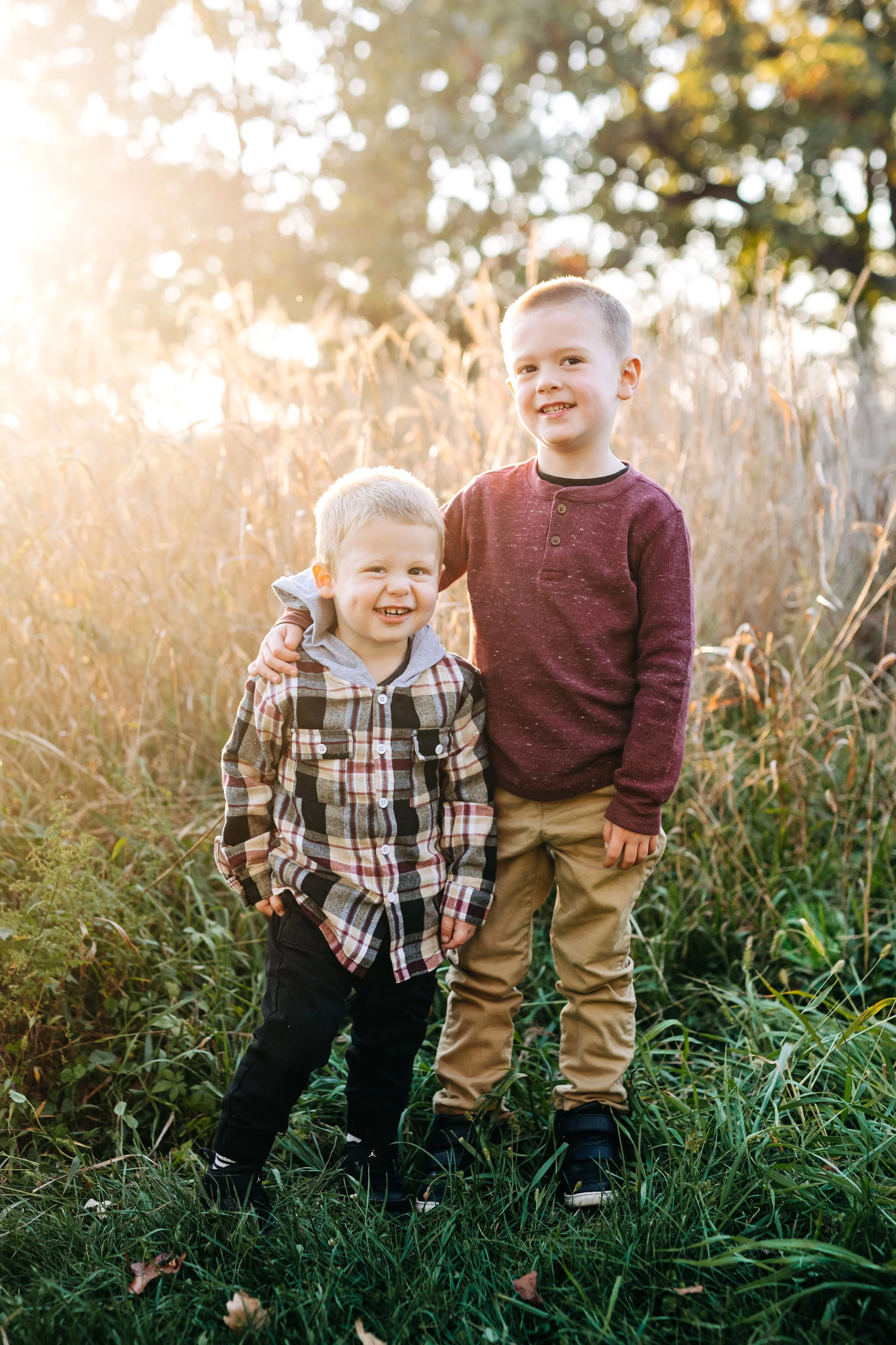 brothers smile for a posed portrait at Trexler Nature Preserve