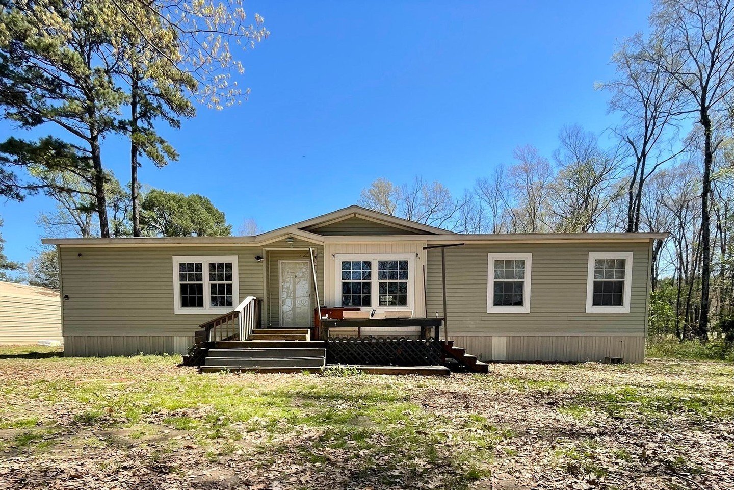 Take a closer look at 1204 AR-95! 👀

Nestled on 5.73 acres in Morrilton and surrounded by serene woods, this charming property offers both tranquility and convenience. With a storm shelter for added peace of mind, the home features an inviting open 