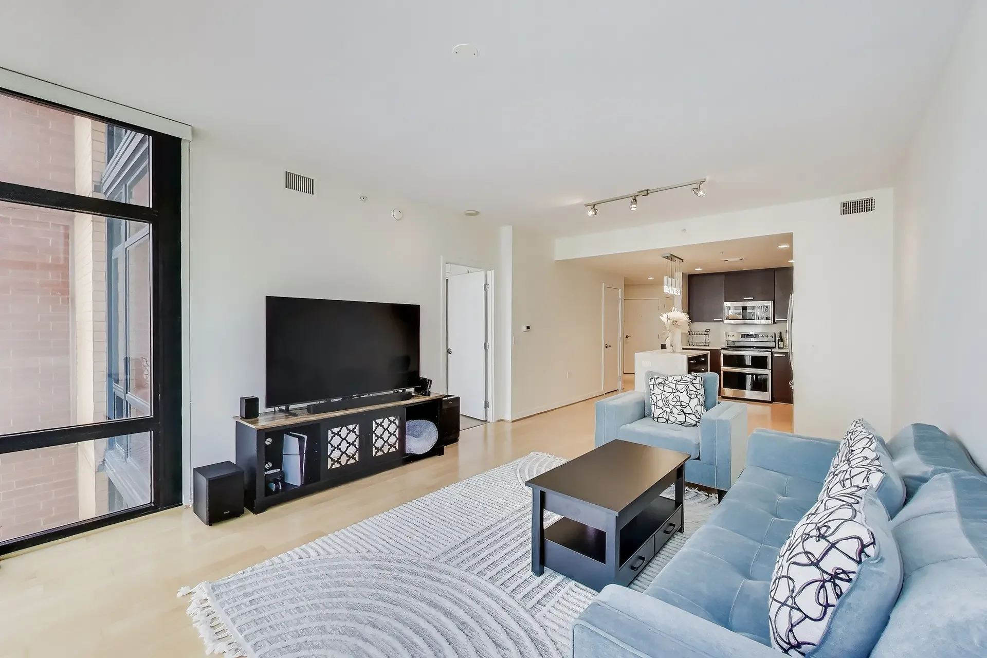1010-massachusetts-ave-nw-805-washington-dc-14-living-room-kitchen.webp