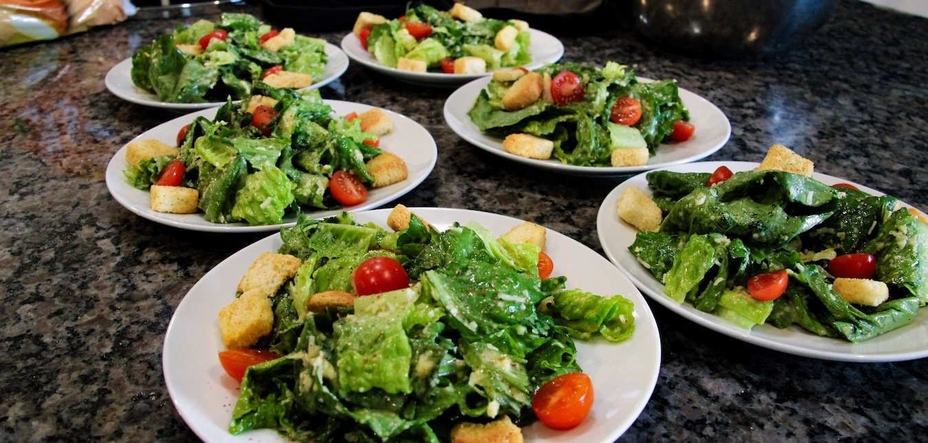 Ceaser salad prepared for a bachelorette party in Denver, Colorado by a private chef.