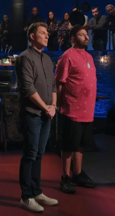 Chef Roilty with Bobby Flay on set