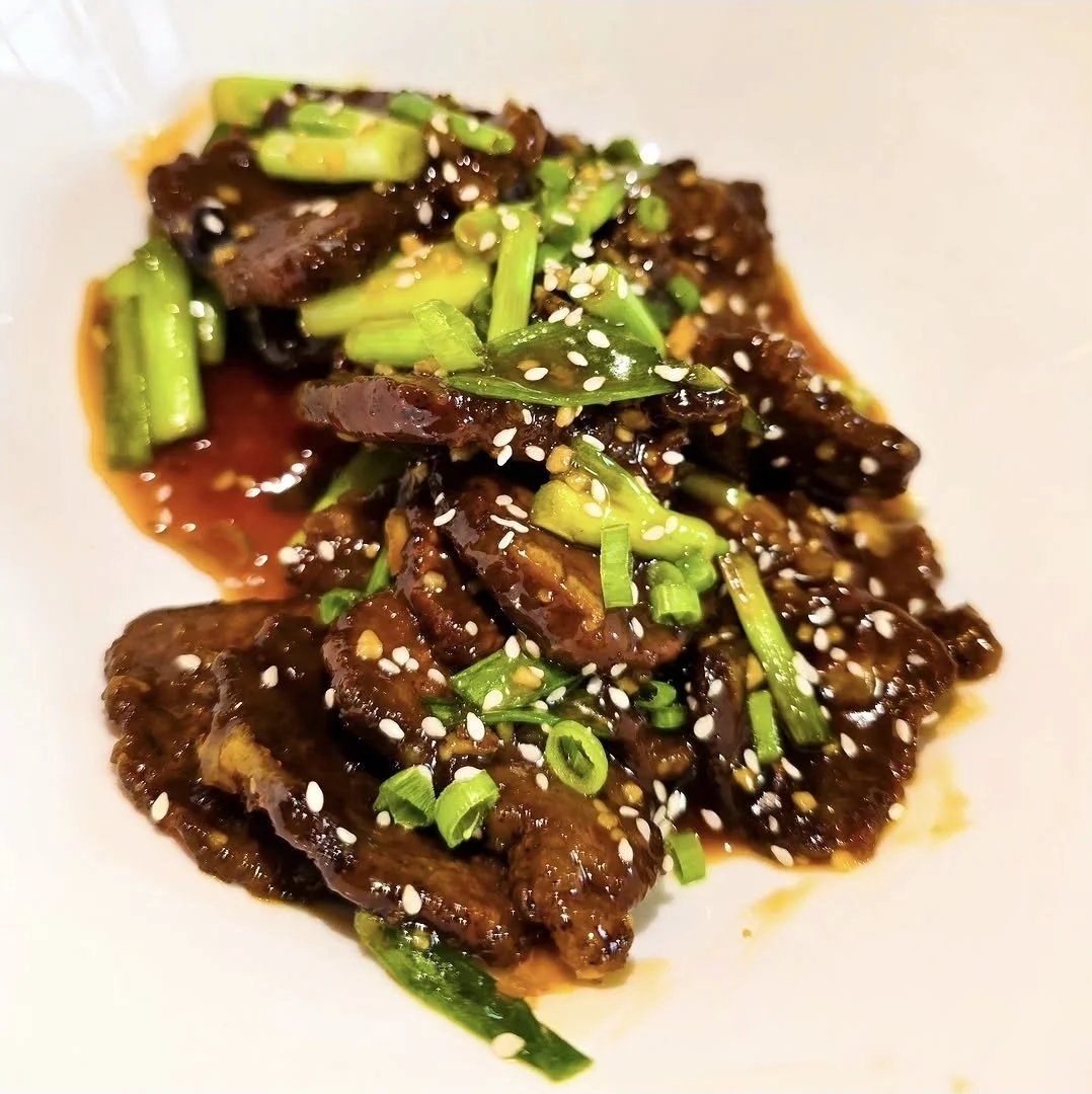 Orange Beef Recipe with Crispy Fried Beef Tossed in Sweet Citrus Sauce and Green Onions.