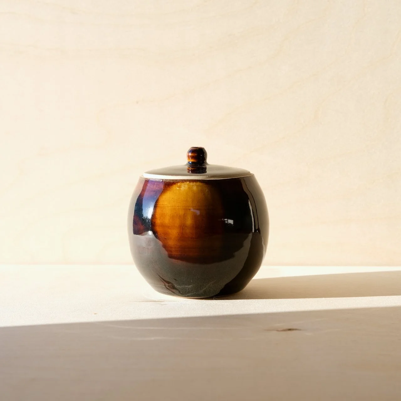 light through dark water jar