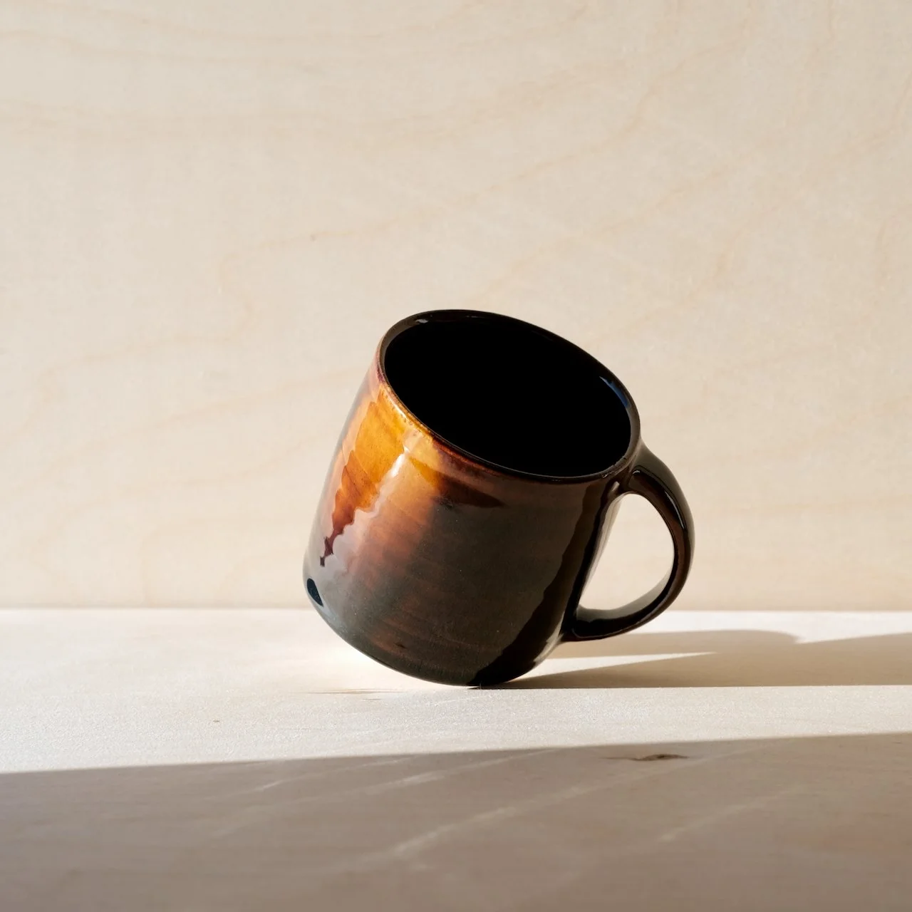 light through dark water mug