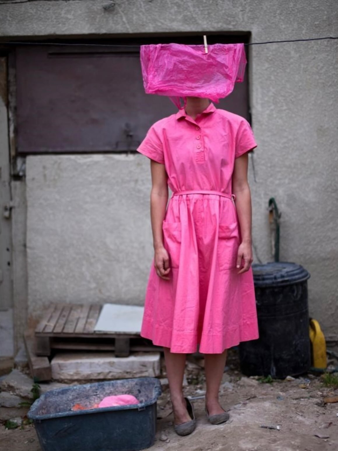 This @odedbalilty photograph is &ldquo;Hide and Seek.&rdquo; I just feel her (and love her). She&rsquo;s hilarious + we are always doing laundry+ pink.
.
.
.
#art #artoninstagram #artistsoninstagram #pink #hideandseek 

.
.