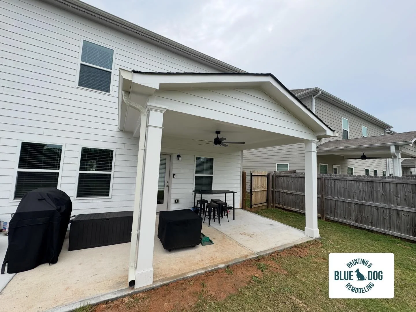 From basic slab to a fully covered outdoor living space! 

We built this custom gabled roof patio with a concrete extension to give this homeowner a space they can actually use year-round &mdash; shade, airflow, and a clean finished look that ties ri