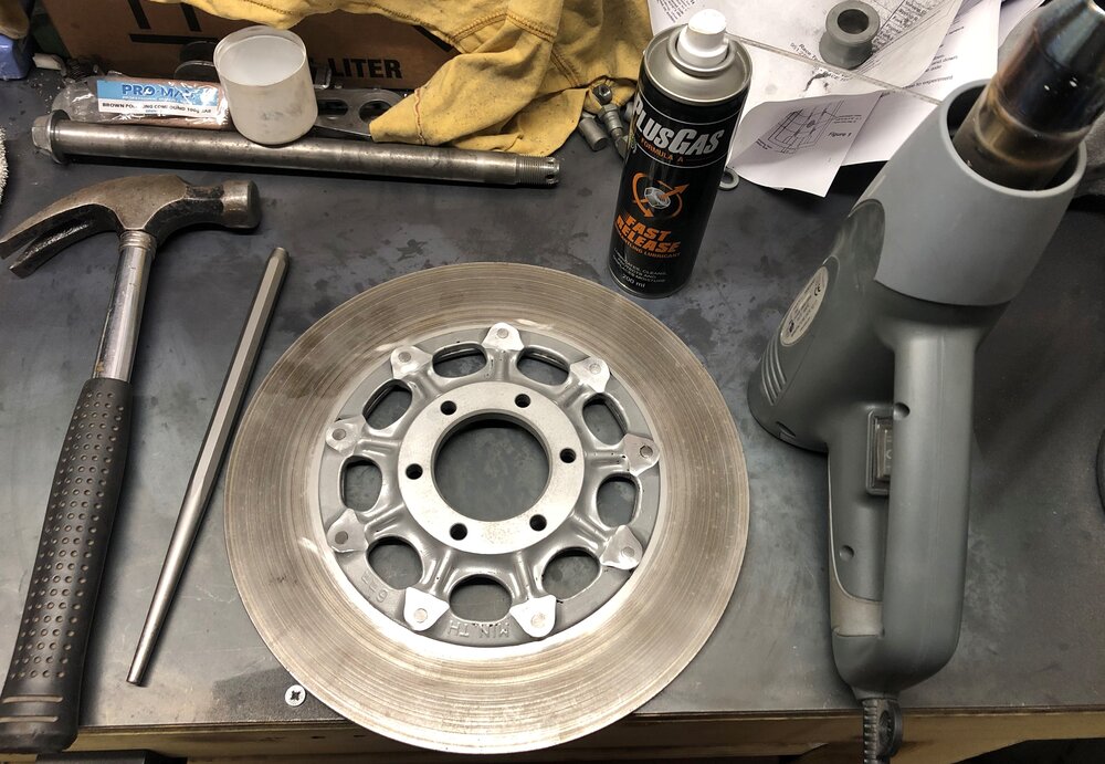 Mable Honda CB550 Cafe Racer brake disc rotor rivet removal heat gun.jpg
