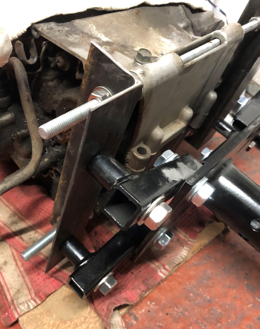 Ride the miles Honda CB550 engine bracket stand threaded bar angle iron bolted.jpg