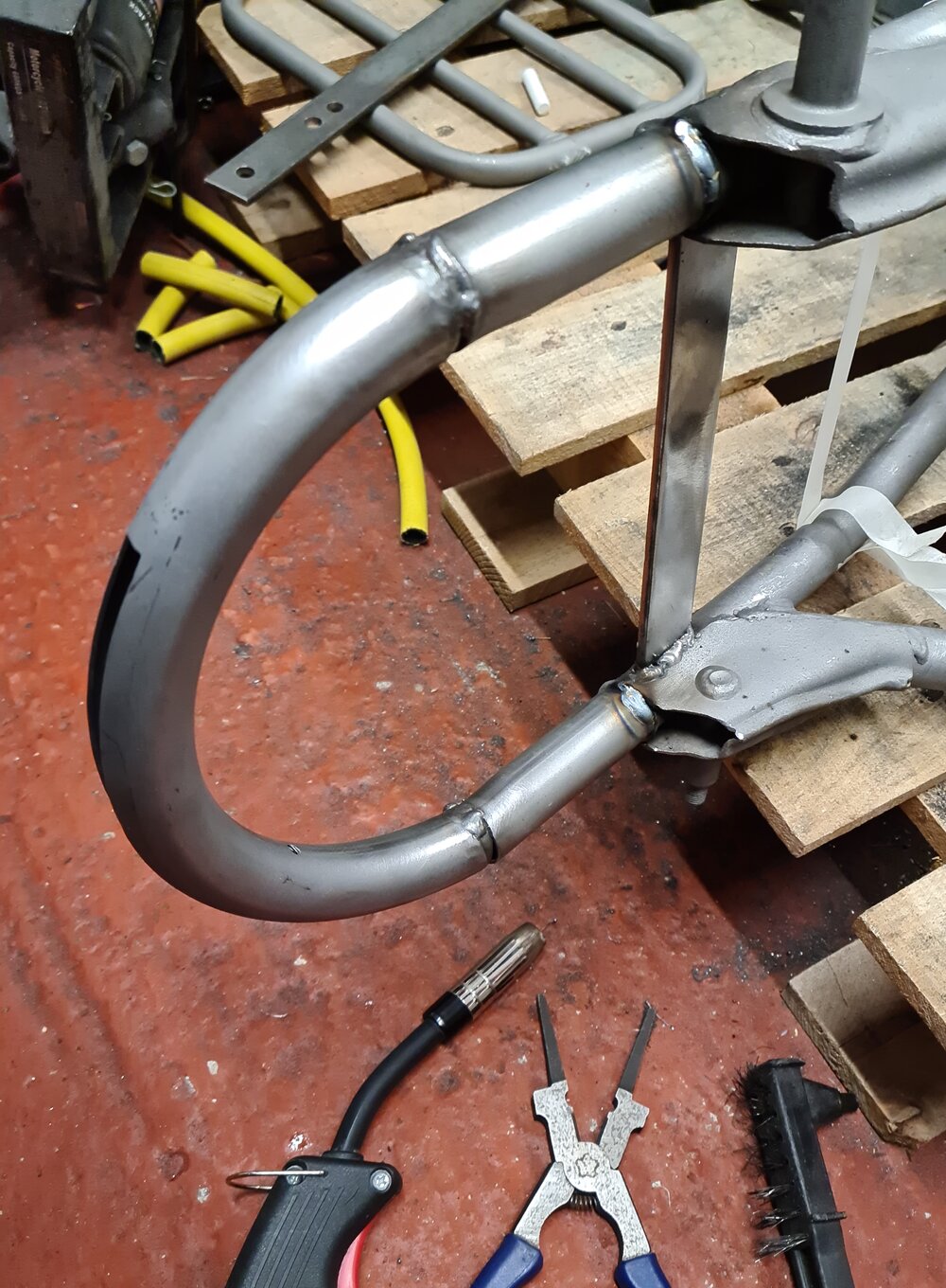Ride the miles Honda CB550 cafe racer brat seat hoop welding.jpg