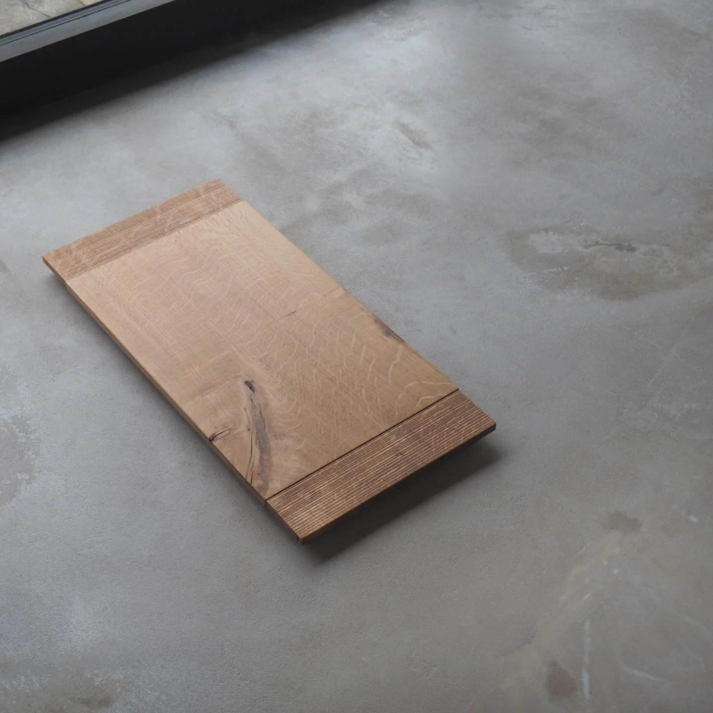 Oak Tray with Sawn Texture 3, available from our online shop. Large sculptural tray with tactile surfaces - a smooth section in the centre and sawn texture on the ends. The English Oak has warm tones with beautiful movement in the grain, lovely medul