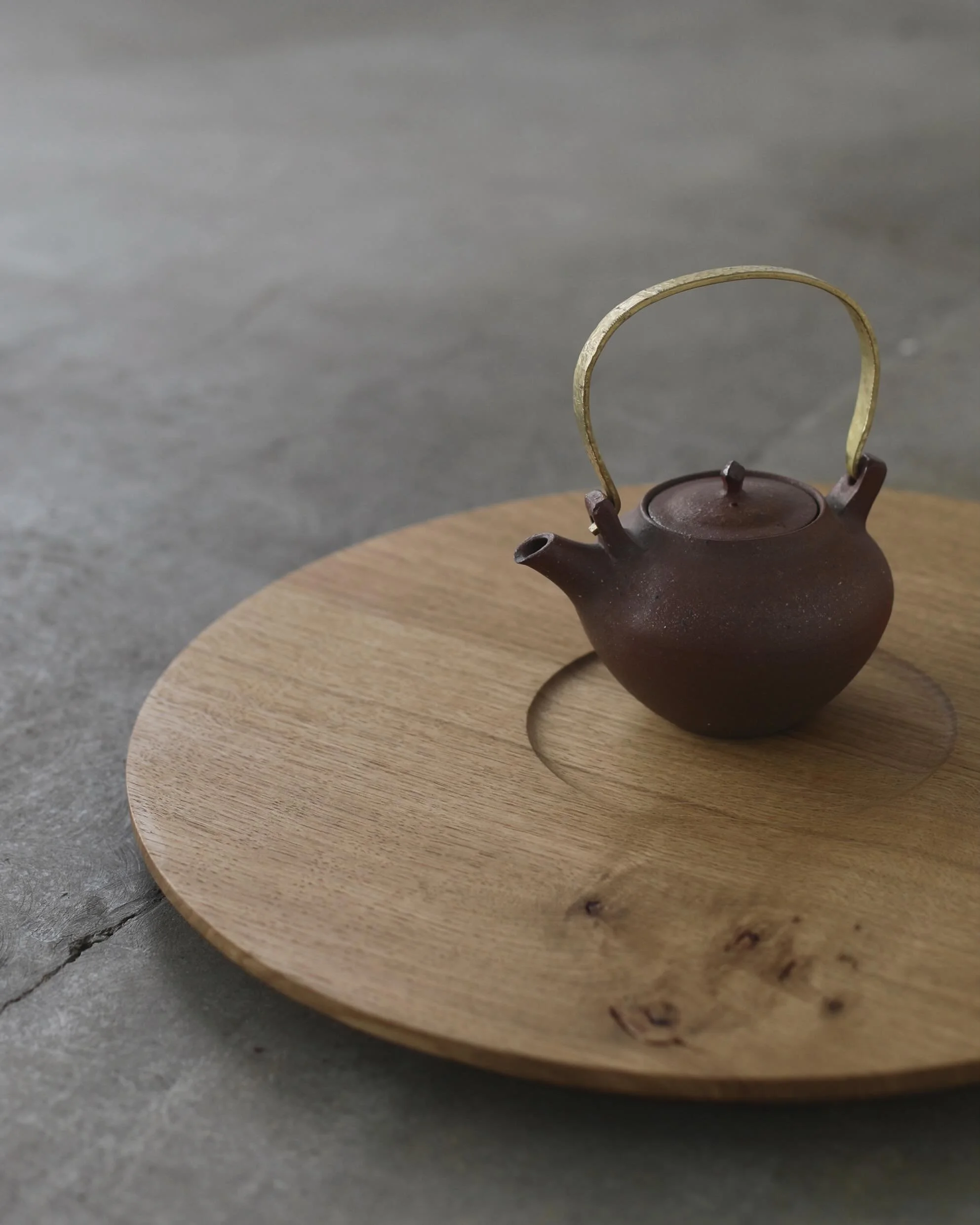 Circular Tray in English Oak with Inner Circle, available @maudandmabellondon 

We chose oak with a warm tone, quite subtle grain patterns, and with just a little group of markings positioned to one side, keeping the large sculptural piece quiet and 