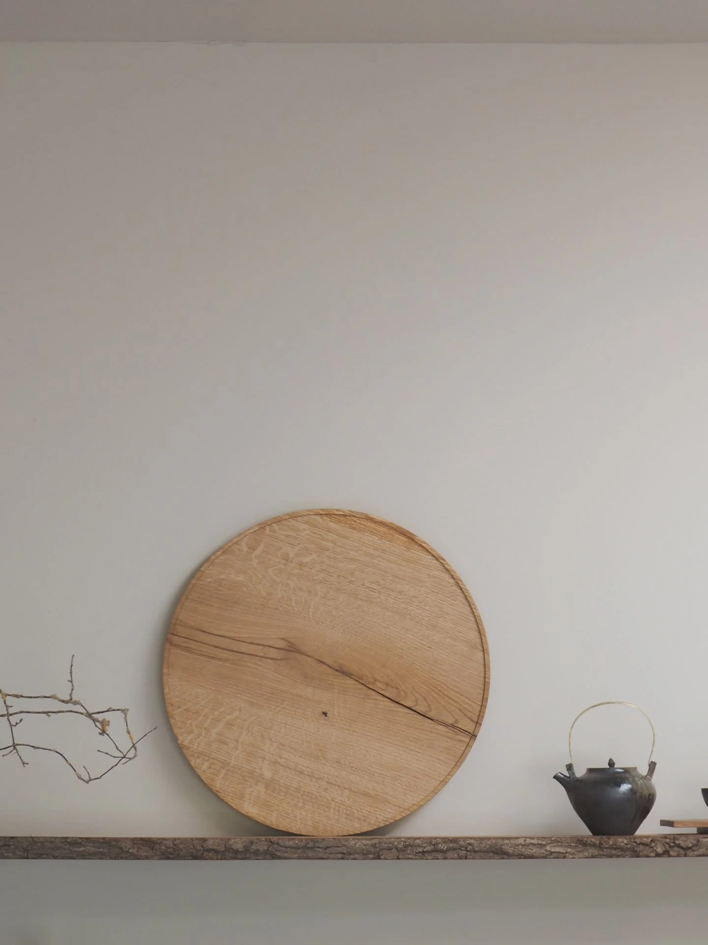 From TEA + CLOUDS, a large circular tray in English Oak with beautiful decorative splits &amp; medullary rays by us, accompanied by a wood-fired teapot with hammered brass handle by Popalini &amp; Jezando.

Both pieces are available at our gallery @f