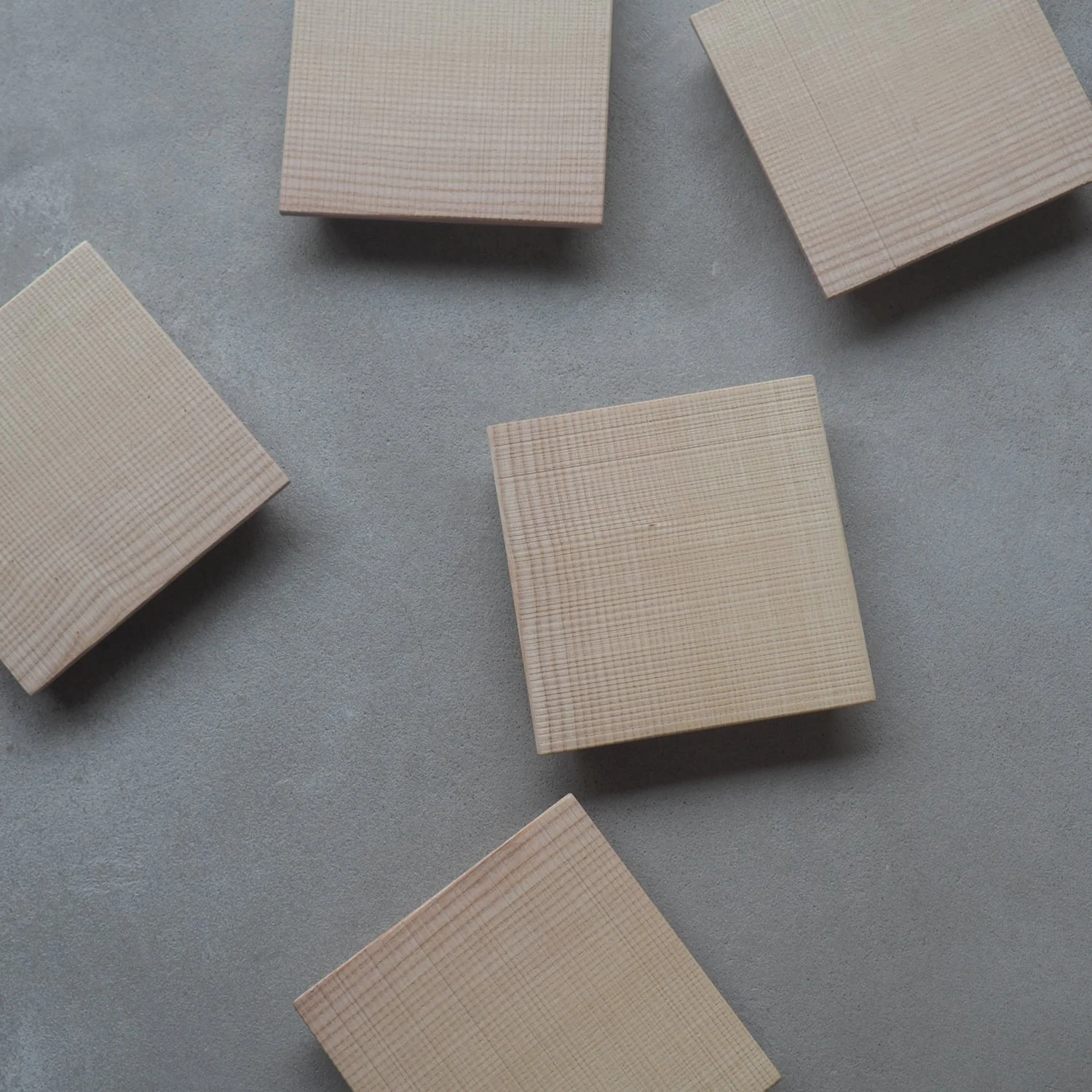 square ash serving plinths with sawn texture