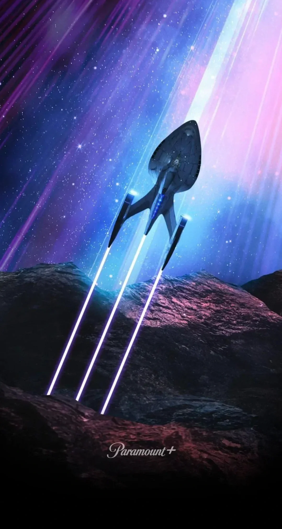 A spaceship flying over rocky terrain in space with colorful blue and purple nebula, stars, and light streaks in the background, with 'Paramount+' branding at the bottom.