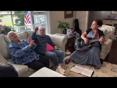 Carolynn Schwartz charms the residents at Just Like Home.