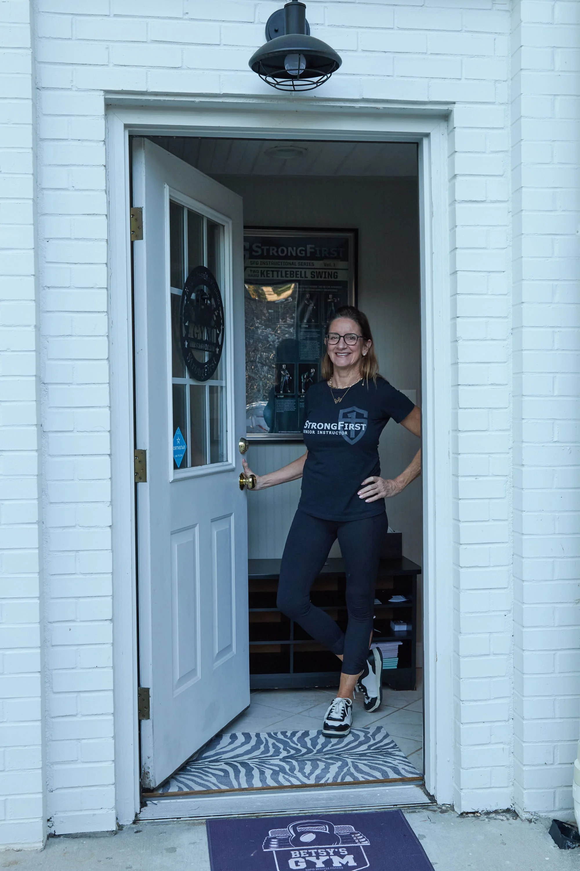 RRF-M-098-web Betsy at door-Strong-First-top 1.jpg