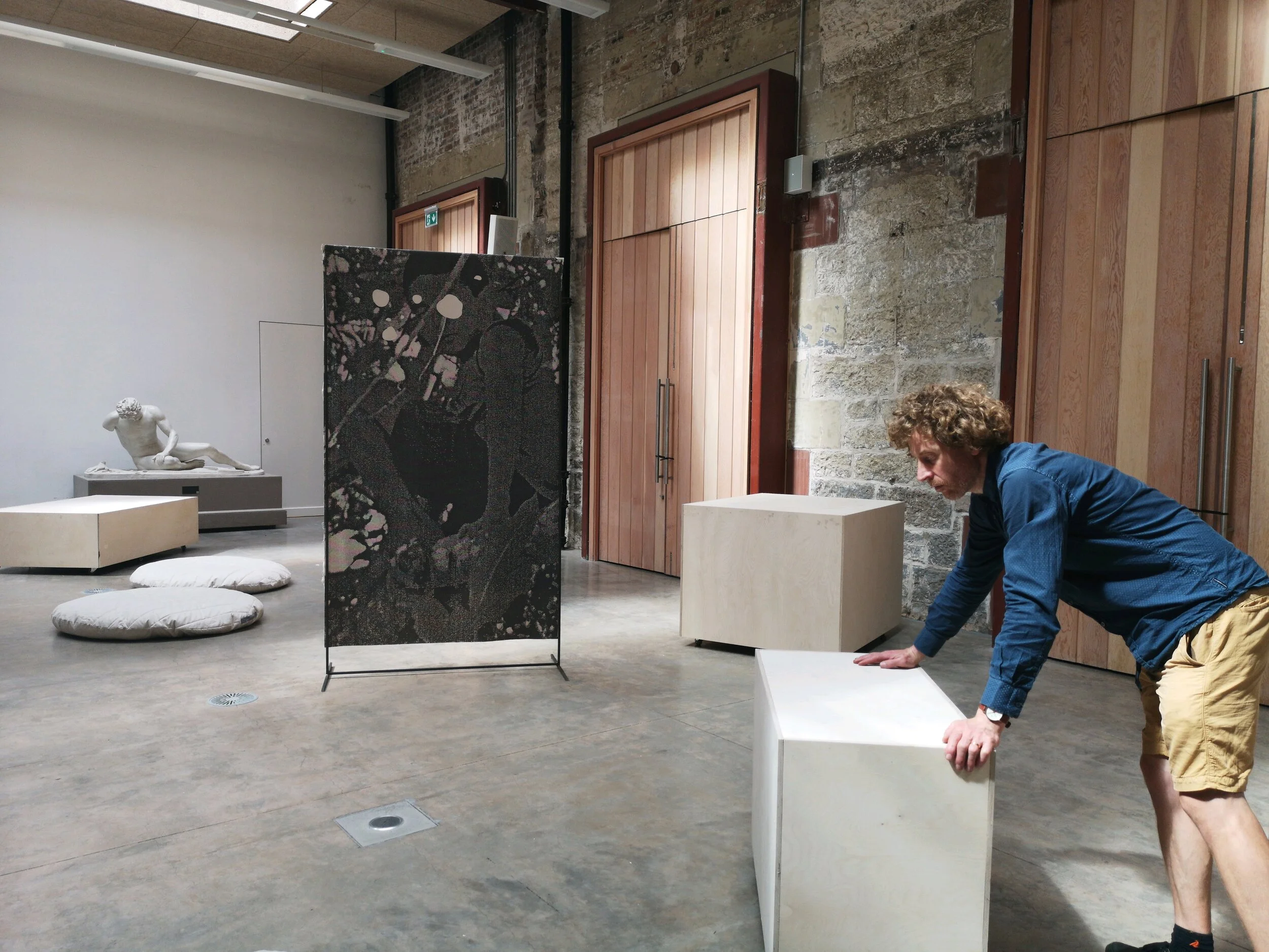 This is a picture of me testing Sonikebana, a nine channel sound piece for mobile loudspeakers that respond to movement. Photo Anna Chapman Parker.