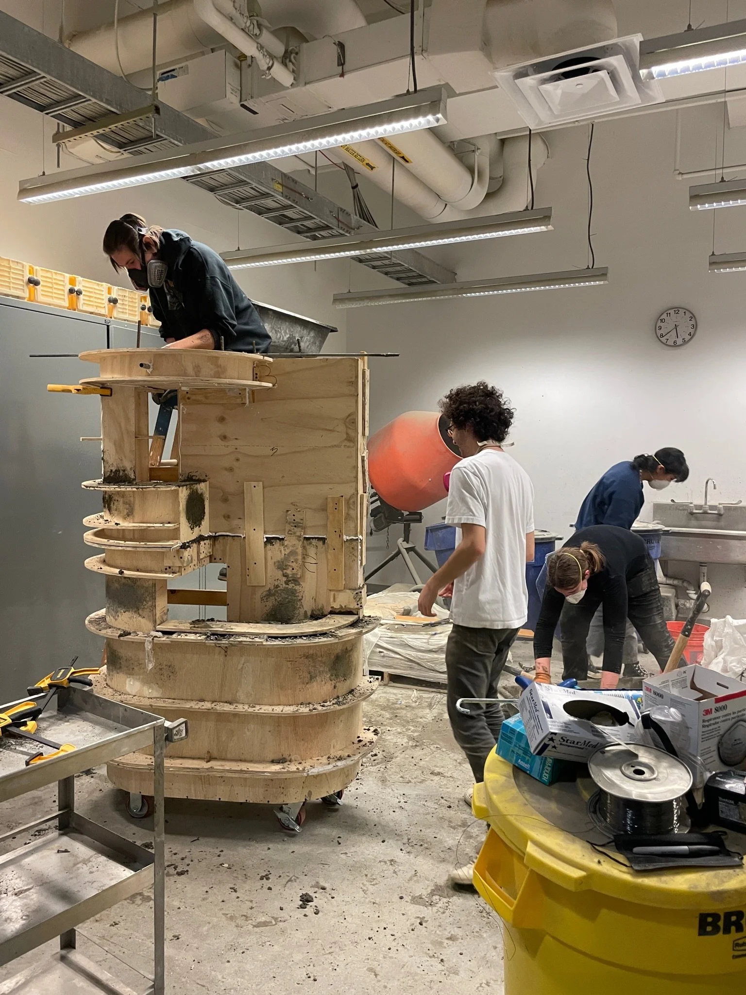  pouring the concrete into the formwork 