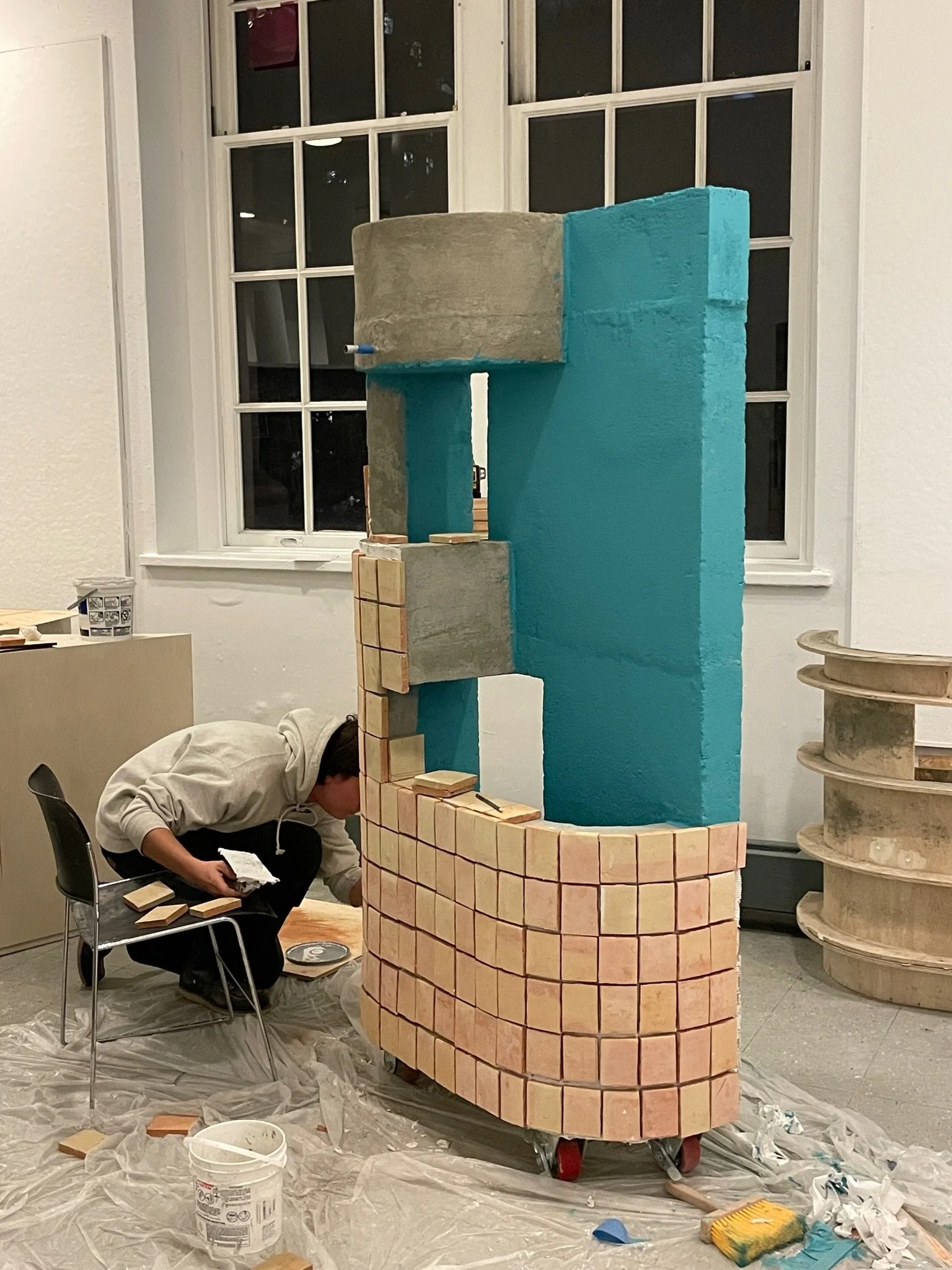  adhering the terracotta tiles 